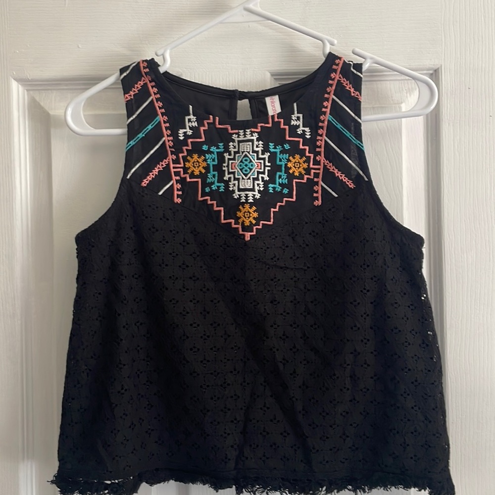 Embroidered black sleeveless top